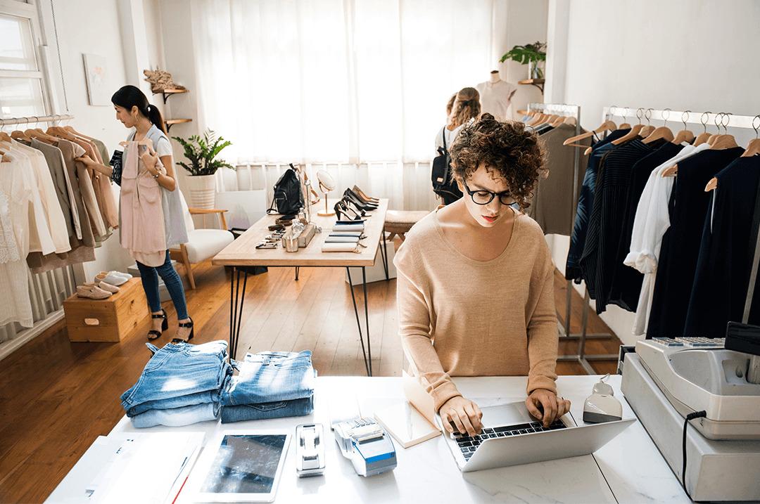 female business owner is using laptop 1080x717 1